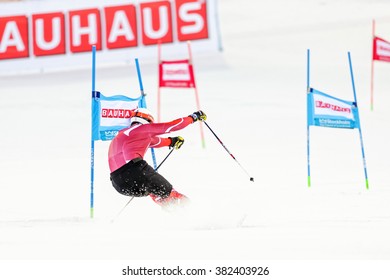 STOCKHOLM, SWEDEN - FEB 23, 2016: Fast Skiier In Red At The Course FIS SKI WORLD CUP At Hammarbybacken In Stockholm