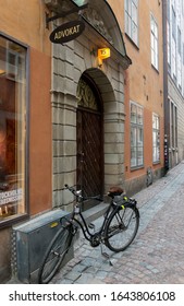Stockholm /Sweden - Jan, 2020: Gamla Stan island, old town: buildings, streets, windows, doors, a bicycle. 