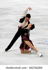 STOCKHOLM, SWEDEN - JANUARY 28, 2015: Charlene GUIGNARD / Marco FABBRI Of Italy Perform Short Dance At ISU European Figure Skating Championship In Globen Arena.