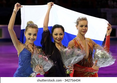 STOCKHOLM, SWEDEN - JANUARY 31, 2015: Elena RADIONOVA (L), Elizaveta TUKTAMYSHEVA, Anna POGORILAYA Pose During Ladies Medal Ceremony At ISU European Figure Skating Championship In Globen Arena.