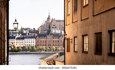 Stockholm, Sweden - Jul 17, 2021: Old Style Architecture At Södermalm Island In Stockholm During Warm Summer Day With Warmer Light. Seen From An Alley On The Opposite Island Riddarholmen.