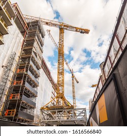 Stockholm, Sweden - July 04 2018: Tall Construction Cranes At Sveavägen.