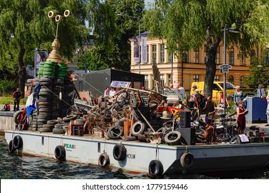 Stockholm, Sweden July 18, 2020 Trash pulled up from the bottom of Lake Malaren and displayed on a barge, a community project called Rena Malaren.