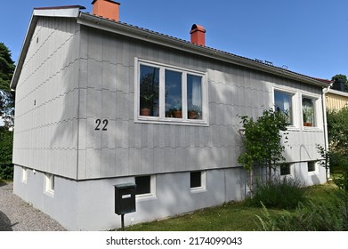 Stockholm, Sweden - July 2, 2022: A Private Home With Walls Covered With Asbestos Cement In A Residential Area In Stockholm, Sweden.