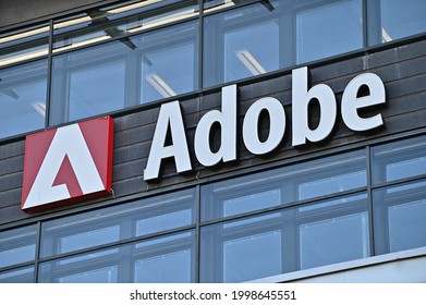 Stockholm, Sweden - July 26, 2021: A wall sign for the American software company Adobe on an office building in Stockholm, Sweden.