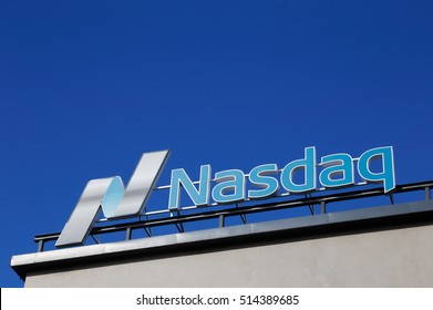 Stockholm, Sweden - July 4, 2016: Close Up Of The Nasdaq Roof Sign At The Office In Stockholm At The Tullvaktsvagen Street Against The Blue Sky.