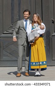 STOCKHOLM, SWEDEN - JUN 06, 2016: The Swedish Prince Carl Philip Bernadotte And Princess Sofia Hellqvist Holding The Newborn Baby Alexander In Front Of The Royal Castle During The Swedish National Day