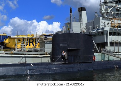 Stockholm, Sweden. June 04, 2022. One Black Submarine  And The Submarine Rescue Warship Belos. Near Slussen, Riddarfjärden, Mälaren.