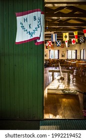 Stockholm, Sweden June 14, 2021 A Boat Club Flagpole Lies Inside The Clubhouse After Painting To Dry.