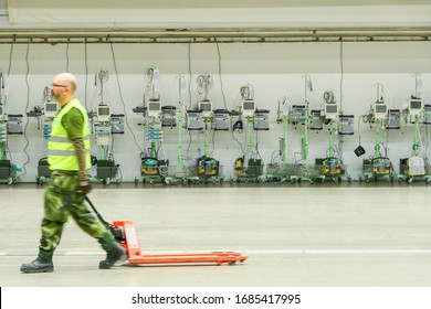 Stockholm, Sweden March 27, 2020 The Stockholm Fair Grounds Are Being Turned Into A Temporary External Hospital To Handle Covid 19 Cases. Here A Warehouse Full Of Medical Supplies Getting Unpacked By 