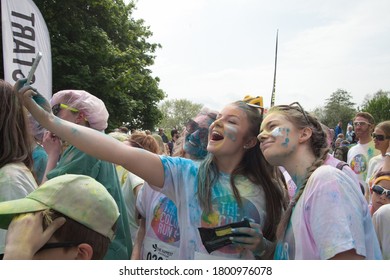 Stockholm, Sweden - May 22, 2016: Taking A Selfie During The Annual Color Run In Stockholm. Covered In Colored Powder.