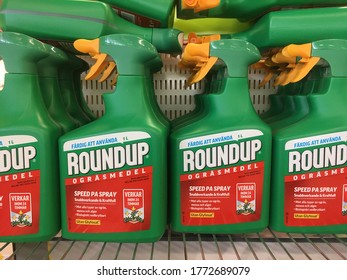 Stockholm, Sweden - May 28, 2020: Spray Bootles Containing The Herbicide Roundup On A Swedish Store Shelf.