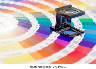 STOCKHOLM - SWEDEN, NOV 08, 2017: Magnifier Or Printers Loupe On Colorful Color Palette In Stockholm, Sweden, November 08, 2017