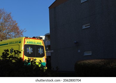 Stockholm, Sweden. October 17, 2021. Swedish Ambulance Car A Sunny Day Outside. Buildings In The Background. Focus Of The Rear Or Backside Of The Emergency Vehicle.