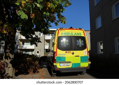 Stockholm, Sweden. October 17, 2021. Swedish Ambulance Car A Sunny Day Outside. Buildings In The Background. Focus Of The Rear Or Backside Of The Emergency Vehicle.