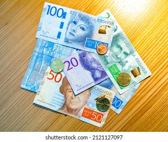 Stockholm, Sweden - October 22, 2021 - Swedish krona, the currency of Sweden (SEK) on a table