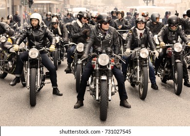 STOCKHOLM, SWEDEN - SEPT 02, 2017: Group of tough bikers in leather clothes on retro motorcycles at the Mods vs Rockers event at the Saint Eriks bridge, Stockholm, Sweden, September 02, 2017