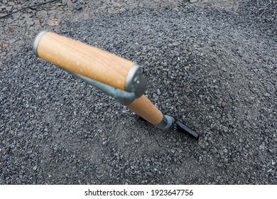 Stockholm, Sweden A Shovel In Sand As Symbol Of Groundbreaking On A Construction Site.