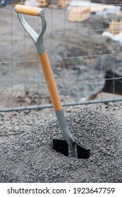 Stockholm, Sweden A Shovel In Sand As Symbol Of Groundbreaking On A Construction Site.