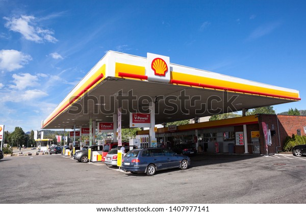 STOCKHOLM, SWEDEN-JUN, 2018: Shell petrol\
filling station is in suburbs of Stockholm city. Exterior of\
building. Shell is largest oil company in the world\
