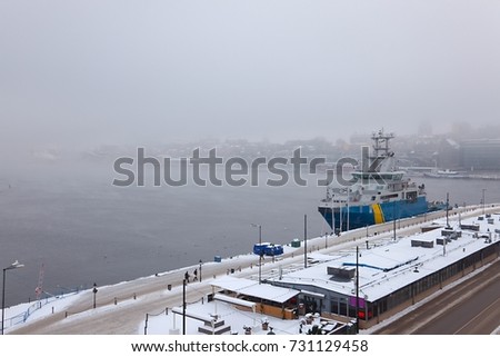 Stockholm waterfront in winter fog