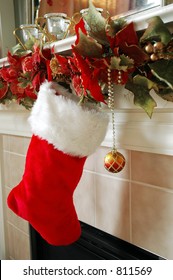 The Stockings Are Hung On The Fireplace Mantle.