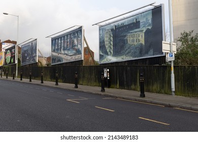 Stockport, Greater Manchester UK. April 6 2022. Three billboards, Wellington Street featuring Helen Clapcott industrial scene