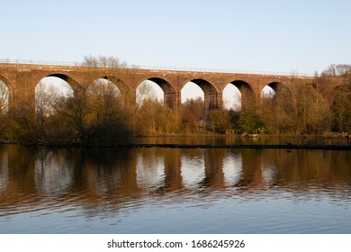 Stockport, Greater Manchester UK. March 27, 2020. 19th Century Reddish Vale 16 span viaduct in country park.
