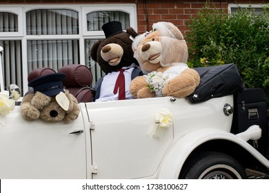 Stockport, Greater Manchester, UK. May 22, 2020. Teddy Bear Display. Wedding Car Scene In White Beauford Open Top For Children's Teddy Bear Hunt, Heaton Moor During  Coronavirus Lock Down Day 58