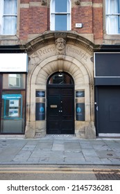 Stockport, Manchester, UK - April 10, 2022: Ornate entrance of a commercial building on St Petersgate, Stockport