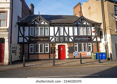 Stockport, Manchester, UK - April 10, 2022: Public house with black and white frontage, Stockport