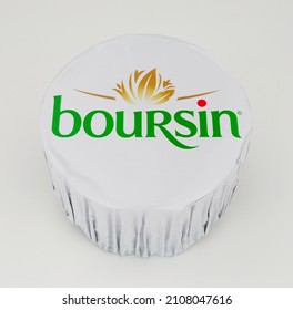 Stockport, United Kingdom, January, 17th, 2022, Boursin garlic and herb full fat soft creamy cheese wrapped in foil packaging