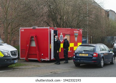 Stockton-onTees, UK. 24th March 2021. Cleveland Police Officers Talk Outside Of A Welfare Unit As A Search For Missing Man Andrew Stones Is Conducted Near Dunmail Road, Stockton. 