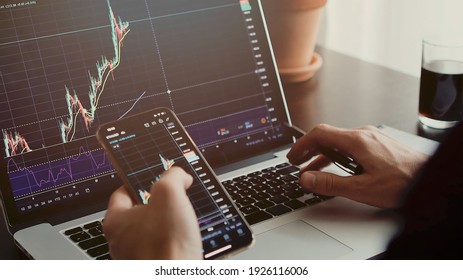 Stocktrader Analyzing Profit Opportunity Investing Bitcoin. Trader Analyzing Stock Trading Graph Phone App. Investment Stockbroker Profit Analysis. Trade Graph Chart. 