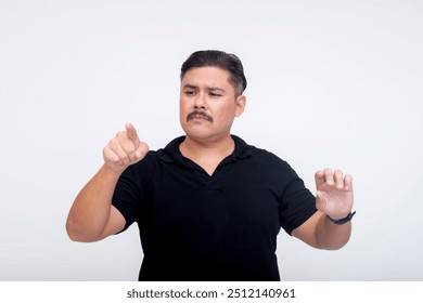 A stocky middle-aged man of mixed race interacting with a virtual screen or menu using his hands. For further editing purpose. Set against a white background.