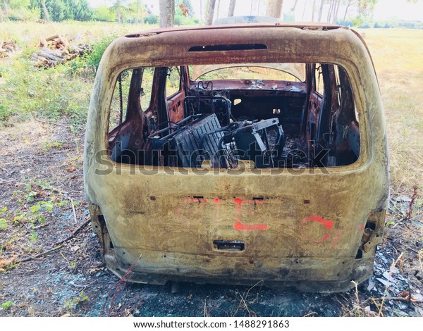 Stolen and burning car in\
the forest 