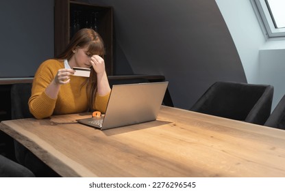 Stolen information in payment process. Confused female hold plastic bank credit card unable to enter billing account website. Disappointed woman client meet with fraud scam purchasing online shopping