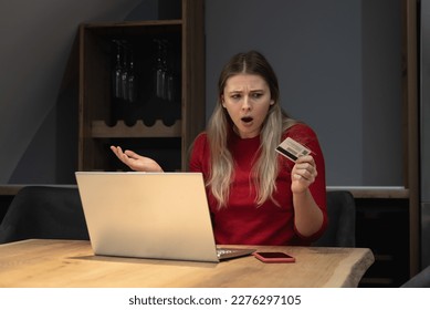 Stolen information in payment process. Confused female hold plastic bank credit card unable to enter billing account website. Disappointed woman client meet with fraud scam purchasing online shopping