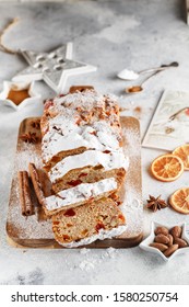 Stollen is fruit bread of nuts, spices, dried or candied fruit, coated with powdered sugar. It is traditional German bread eaten during the Christmas season. New year prep. Holiday baking