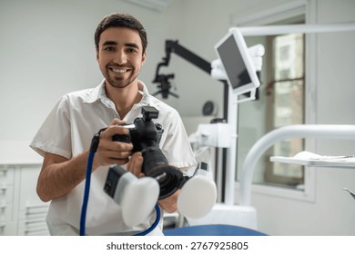 Stomatologist using professional camera with ring flash for dental clinical records