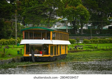 Stomy clouds over Gregory Lake in Nuwara Eliya. Lake Gregory is a reservoir in centre of the tea country hill city Nuwara Eliya in Sri Lanka.
