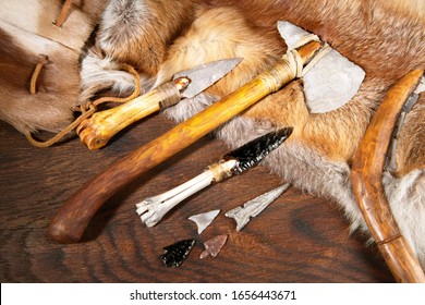 Stone Age Tools On Wooden Background