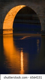 Stone Arch Bridge Arch Reflection - Minneapolis MN - one arch reflects on water of Mississippi River