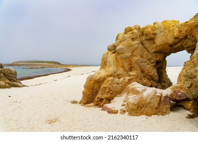 Stone Arch On A Brittany Beach