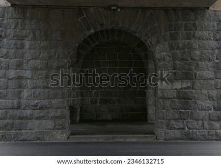 Stone archway in medieval castle. Ancient wall with arc of Akershus Castle in Oslo.
