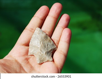 Stone Arrowhead In Hand