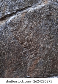 Stone background with the name Efake.