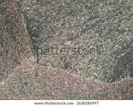 Stone background with the name Joel.