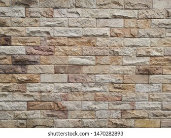 Stone background walls are stacked. Stone cladding background and wallpaper.brick wall background. Brick wall texture background.