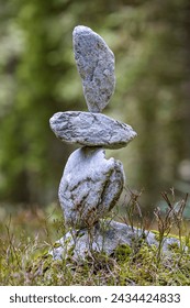 stone balancing, art of stacking or juxtaposing stones, constitutes a challenge to gravity